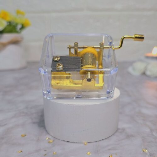 جعبه موزیکال شفاف با موتور طلایی